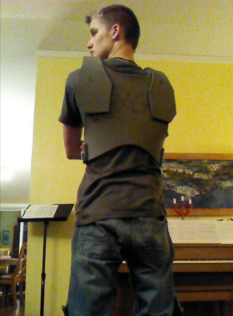 Back of "Vest." (WIP)

 Yes, I know that the shoulder blade things are on the wrong sides. I am still kicking myself because of it.